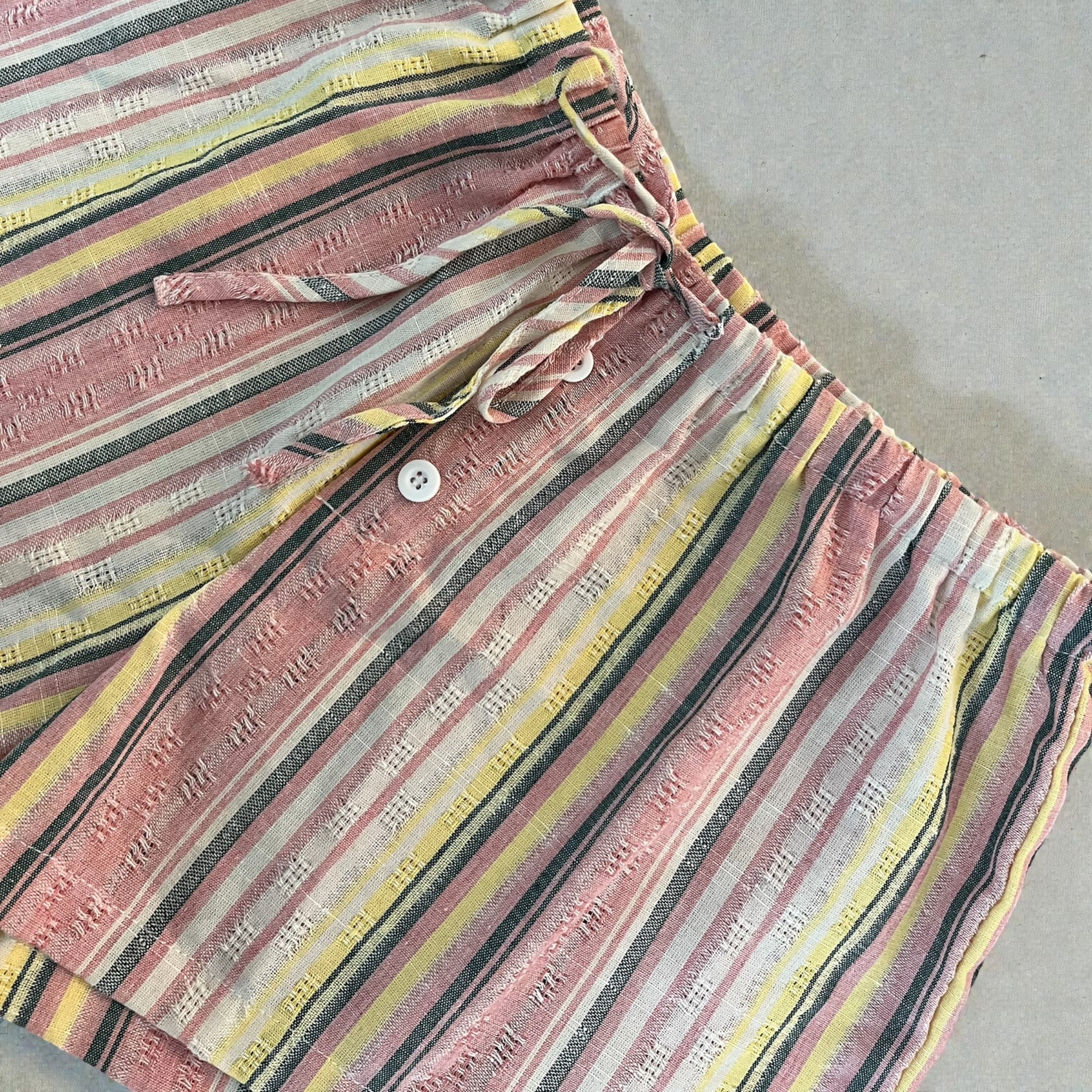 Sunset Tide striped shorts